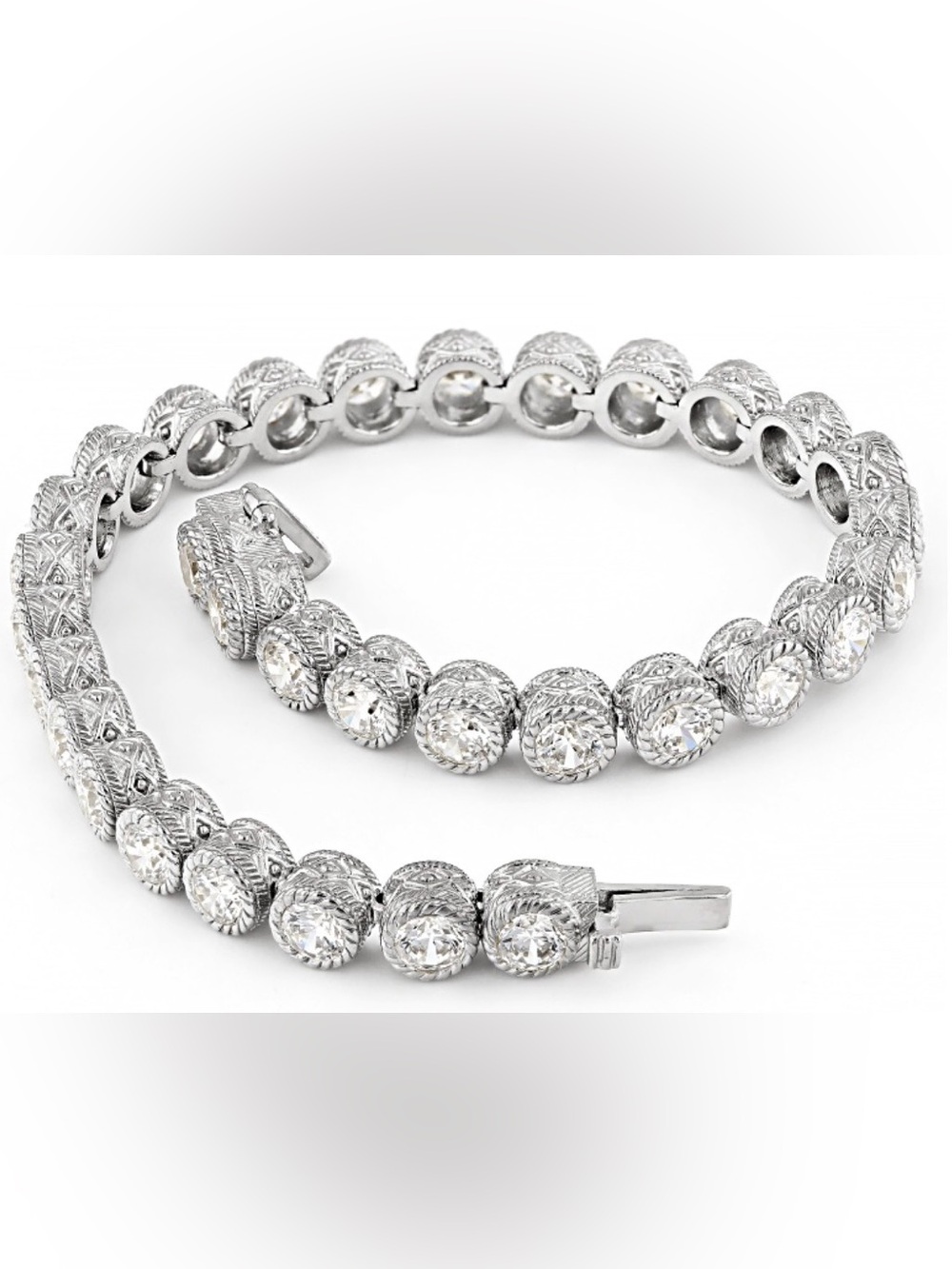 Judith Ripka silver tennis bracelet 7” like new condition.